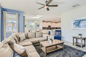 Main level living room with comfy sectional