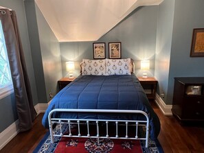 Queen bed upstairs with closet for storage. 
