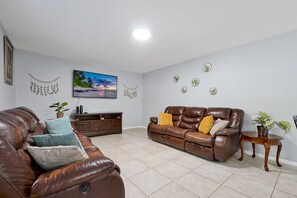 Main Living Room with 4k Smart TV & 2 extremely comfortable couches with reclining seats