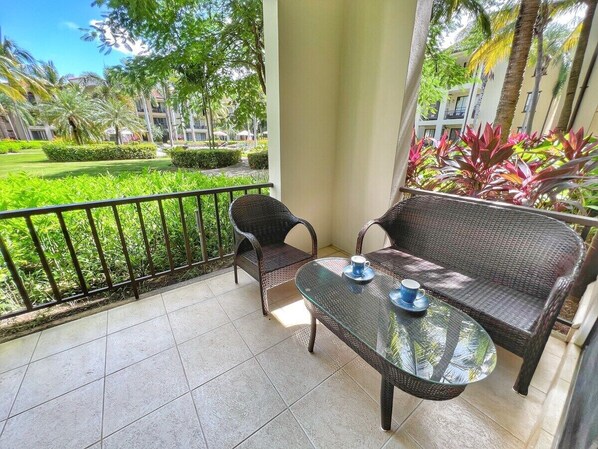 L1302 is a ground floor unit set back from the pool and just inside the PACIFICO main gate.  Relax in the shade on your private outdoor terrace.  