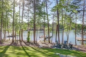 Flat stone path to enormous oversized deep water (10-12ft) dock on calm cove