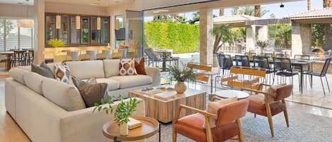 Welcome to Casa Palmera! Experience true indoor/outdoor living with 23-foot sliding glass doors.