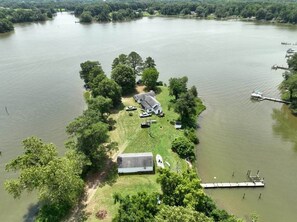 View of the house, cottage, garage and dock. 