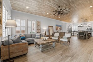 The first of three levels, a spacious open floor plan, and a chef's kitchen.