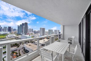 Water and Miami skyline views of furnished balcony