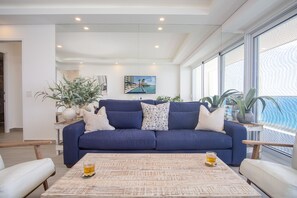 sofa and large mirror in living room