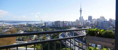 View from the balcony out to the Harbour Bridge and Sky Tower