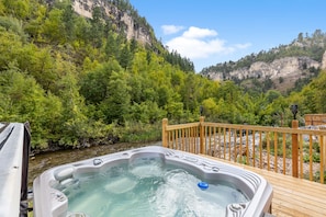 Hot tub overlooking creek