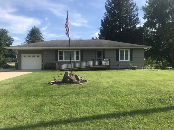 Ranch style home with ramp.