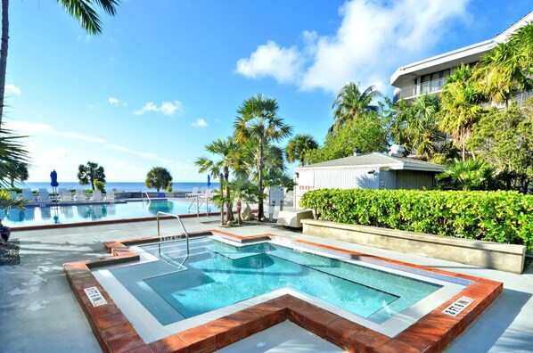 Take a dip in the hot tub and watch the sunset over the beach.