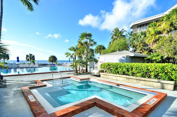 Take a dip in the hot tub and watch the sunset over the beach.