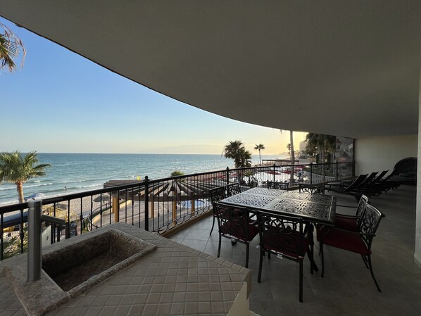 Oversized terrace with lots of seating for enjoying view while you dine or relax