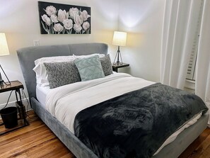 Relax in your second floor bedroom with the queen-sized bed or watch TV!