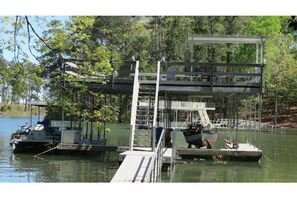 2 story dock. 2 boat slips. Deep water. Beautiful lake view from upper deck.