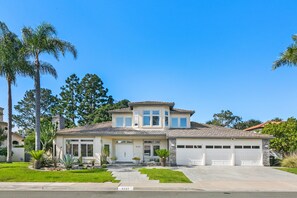 Front View of Home with Three-Car Driveway