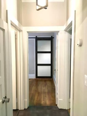 multiple closets which allow for natural light to flow through