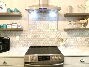 fully refinished kitchen with all you may need to cook. (2)