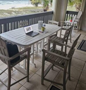 Great spot to work from.  There is a power outlet, comfortable seating, nice breeze, two ceiling fans.  this is where I work from if not working from the beach.  The wifi does reach the beach also.  
