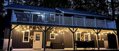 Experience the enchanting allure of our duplex under the blanket of the night sky. Illuminated by the soft glow of twinkling lights, the duplex exudes a warm and welcoming ambiance, inviting you to unwind and embrace the tranquility of the evening.