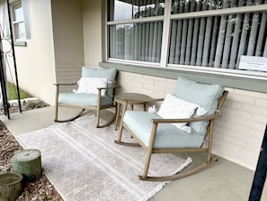 Front porch with new rocking chairs set.