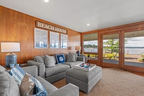 Spaces for gathering enhanced with large windows that bring the outdoors in.