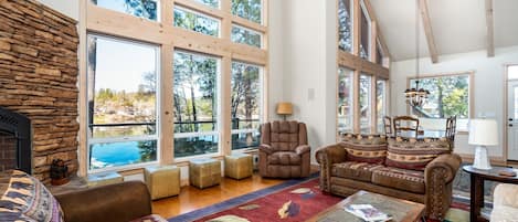 Cozy living room with fireplace and a view of the lake. Pine Mountain Lake Vacation Rental "Casa Cassaretto" - Unit 1 Lot 453-A.