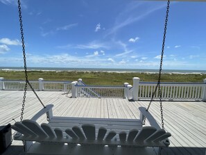 Unobstructed view of beach. Large deck with large covered area 