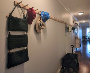Landing spot as you enter for beach towels, hats and beach bags