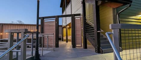 Shared space in front of Suite #1's Private Deck. Suites 1, 3 & 4 are Visitable — allowing you to have clients visit the front office area of your private Suite — with an accessible restroom in each Suite. #2, upstairs is not wheelchair accessible.