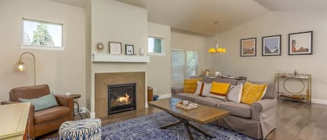 Relax in this newly furnished living space with a cozy fireplace