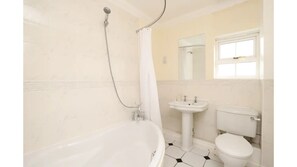 Bathroom: Bathtub, Shower Head, WC & Basin
