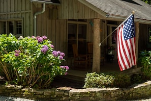 Front of the home - two rocking chairs and a swing