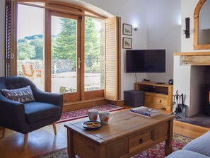 Living room with access to the patio | Carmarthen Cottages- Barn Cottage - Carmarthen Cottages, Cwmdu, Near Llandeilo