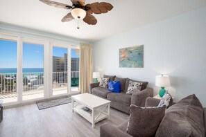 Living Area with Ocean Views, Flat Screen TV, Sleeper Sofa and Private Balcony Access