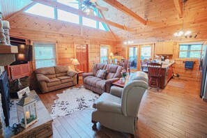 Main Floor Living Room, Dining and Kitchen. Living Room has Wood Burning Fireplace. Open Floor Plan