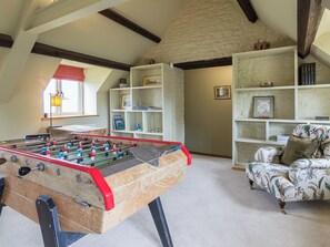 Sitting room area with table football game | The Long Barn - Crucis, Ampney Crucis, near Cirencester
