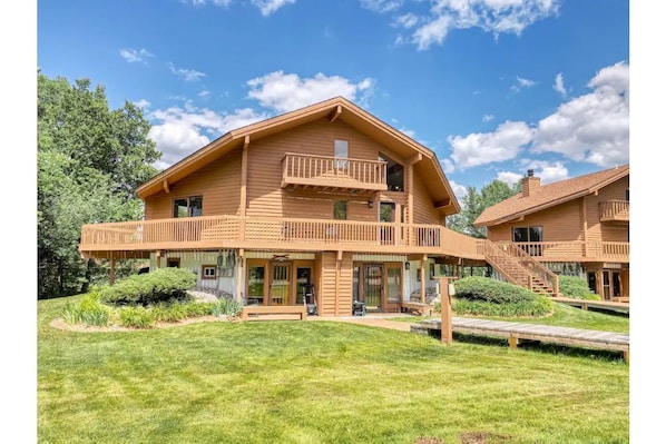Second floor condo with expansive deck and views of ski hill and golf course.