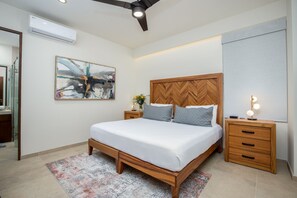 Master bedroom with king bed and 55 inch TV 