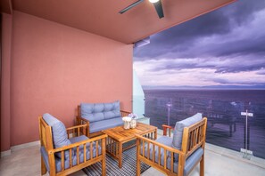 Balcony with amazing ocean views and outside furniture