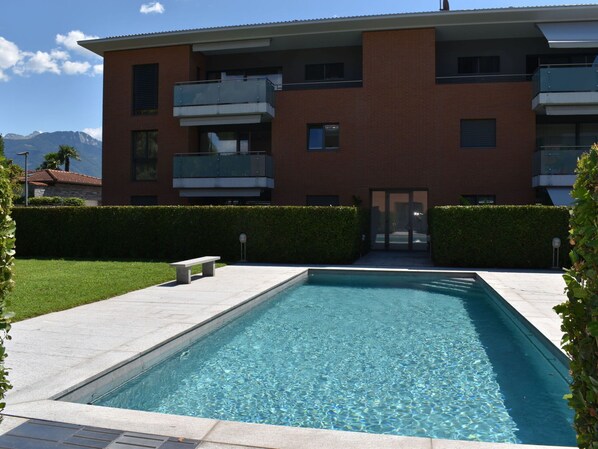 Water, Plant, Property, Sky, Window, Swimming Pool, Azure, Building, Green, Rectangle