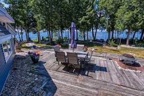 Enjoy this waterfront property and outdoor space including an area for dining