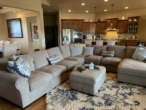 Large open great room with plenty of comfortable seating.