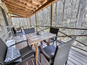 Deck overlooking Shoal Creek. Party lights and comfortable seating