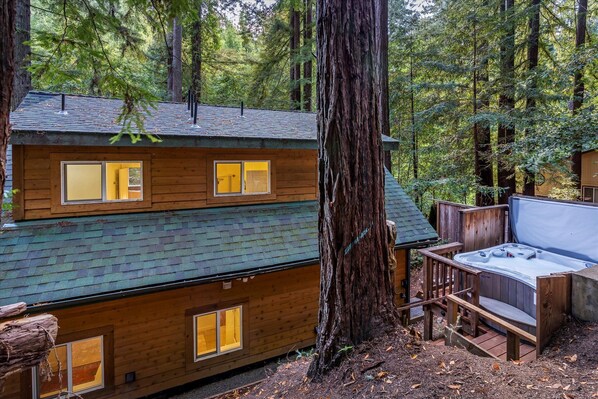 The hot tub is conveniently located behind the house for - optimum privacy.
