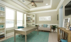 The office area has enough space for you to work, study or just enjoy private time. The room is furnished with a charming sofa, large office desk and chair.