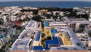 The condominium has 4 rooftop swimming pools and only a few minutes walk to the beach.