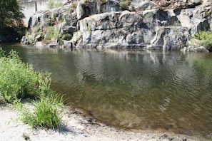 You can walk to this swimming hole near the cabin.