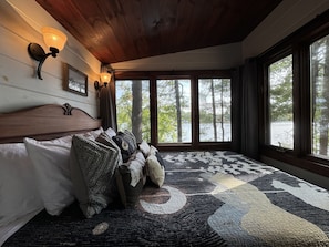 Queen bedroom has amazing lake view. Room darkening curtains for sleeping in.