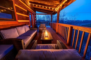 Enjoy the warmth of a propane Fire Pit on the rear deck in the cool evenings. 