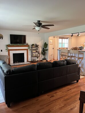 Family room to gather with large Roku streaming tv. 